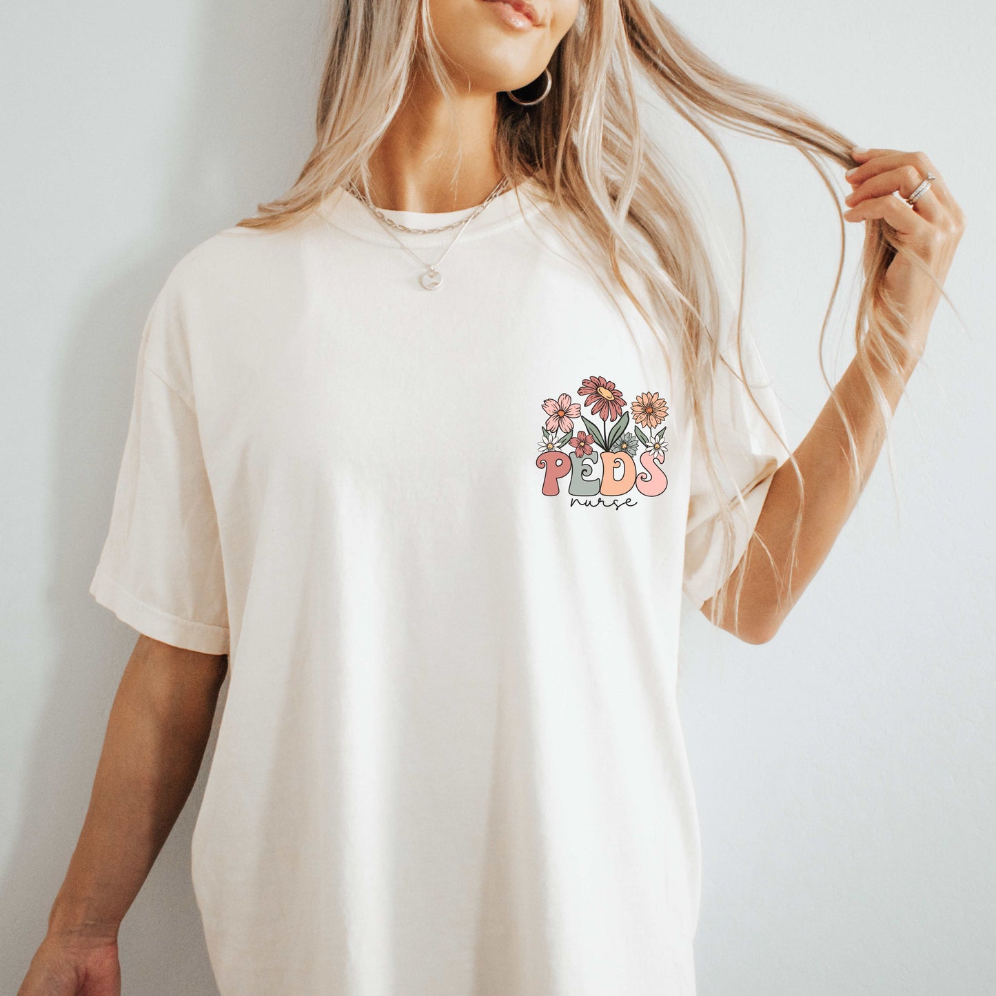 dBoldTees & DTF Transfers Peds w/ Nurse Floral Front Pocket & Back Design - Bella & Canvas Vintage White