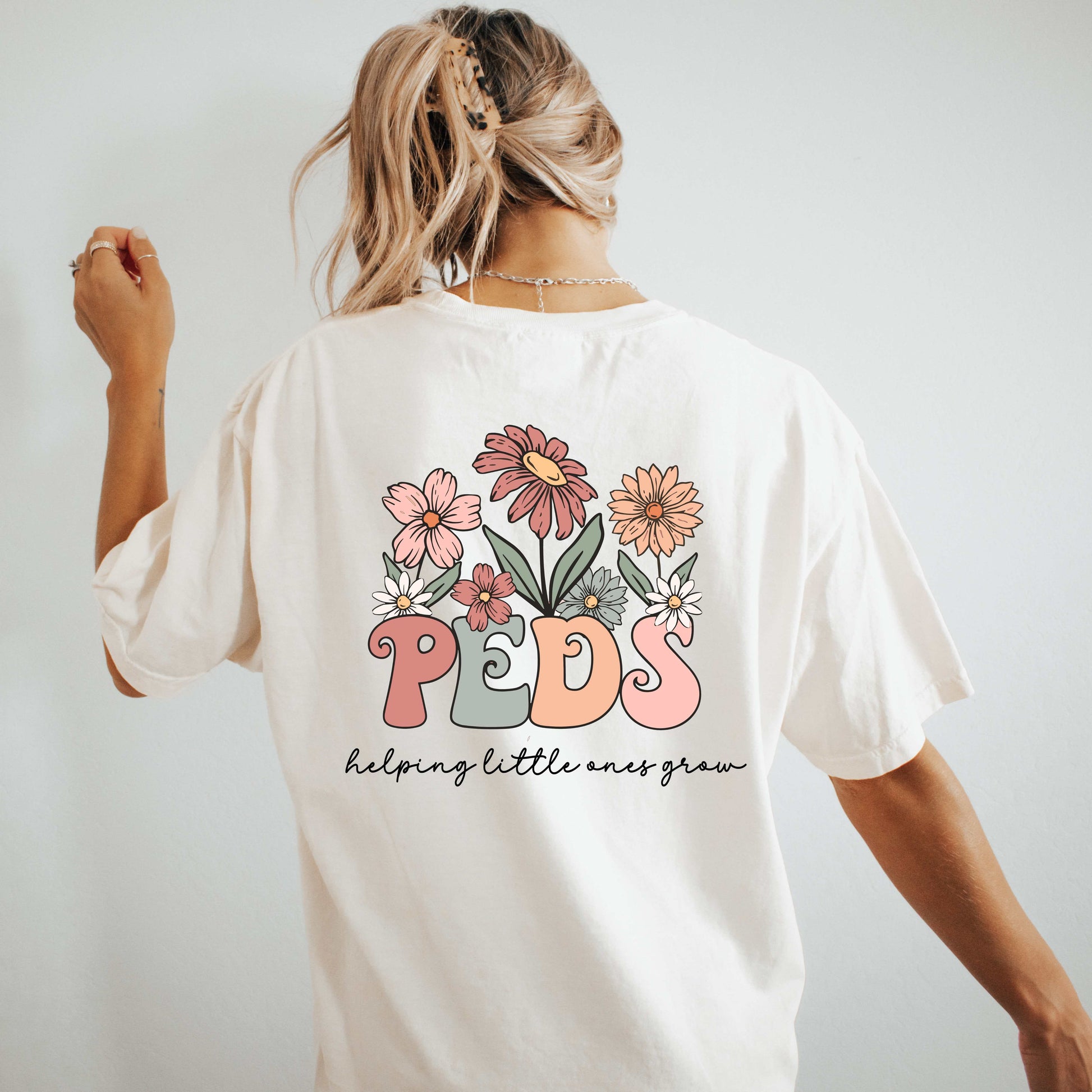 dBoldTees & DTF Transfers Peds w/ Nurse Floral Front Pocket & Back Design - Bella & Canvas Vintage White